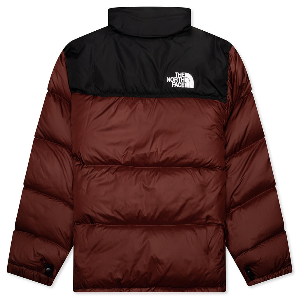 Brown puffer jacket with black hood featuring The North Face logo on a white background