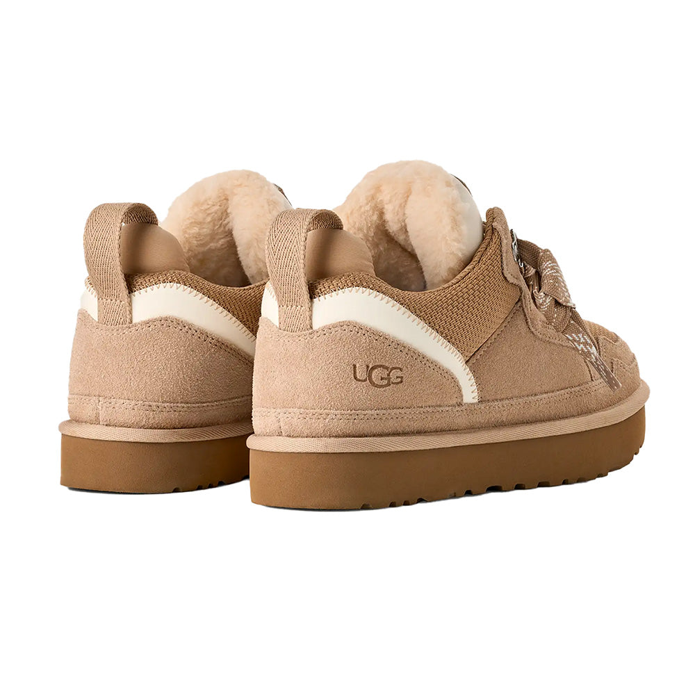 Sand UGG low-top sneakers, rear view, suede, mesh, fuzzy lining, brown sole, UGG logo.