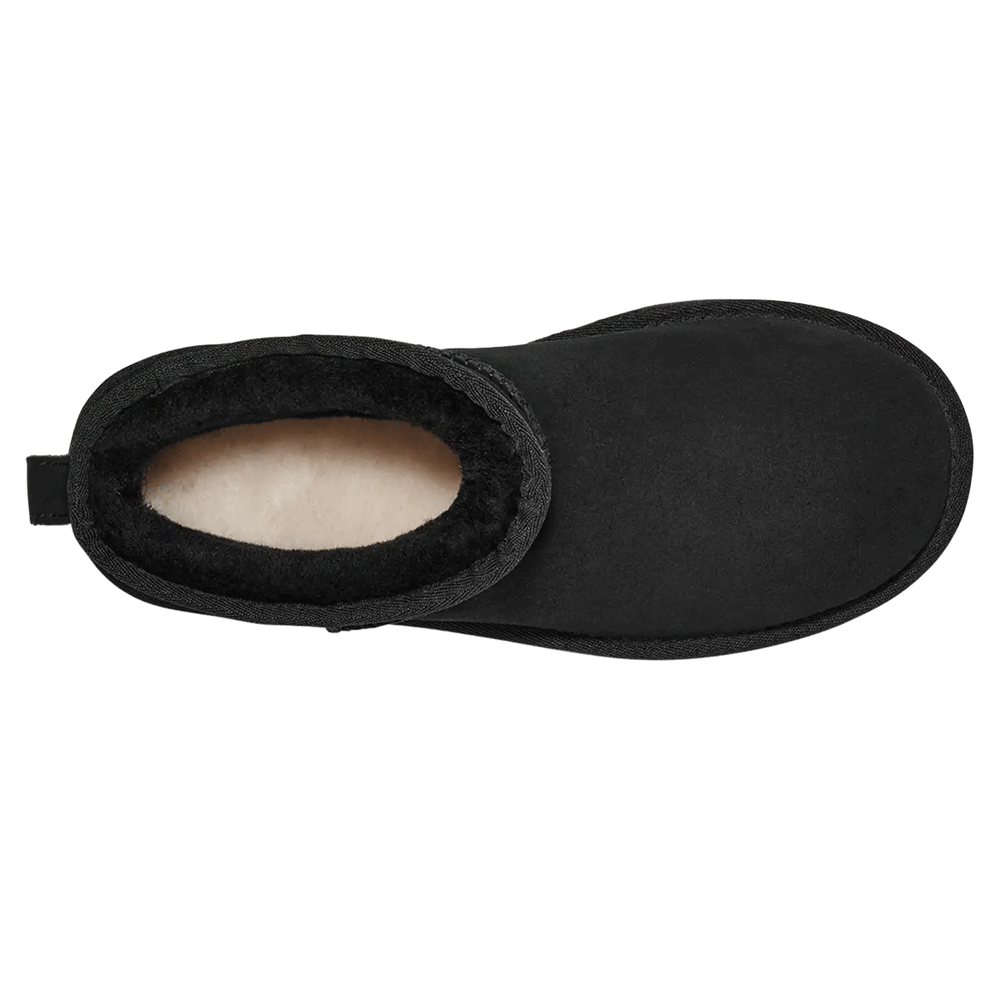 Overhead view of a black suede UGG Classic Boot Ultra Mini Platform, showing the beige UGGplush lining inside the boot shaft.
