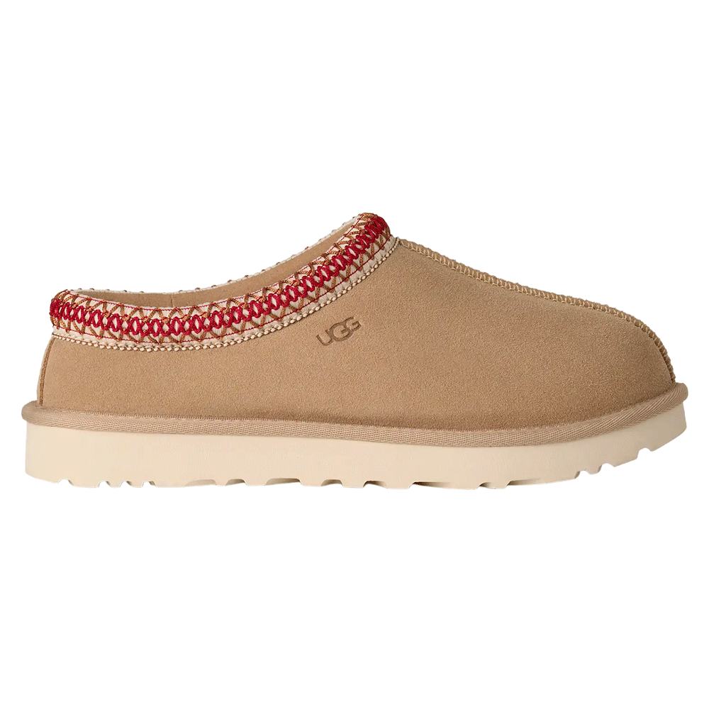 Side view of the UGG Tasman II slipper, a low-profile slip-on featuring a suede upper and the signature zig-zag UGGbraid trim around the collar. The slipper is lined with plush sheepskin and has a comfortable Sugarcane EVA outsole, ideal for indoor and outdoor wear.