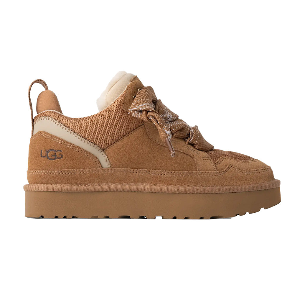Chestnut UGG low-top sneaker, right foot view, suede and mesh, cream sole, decorative strap, UGG logo.