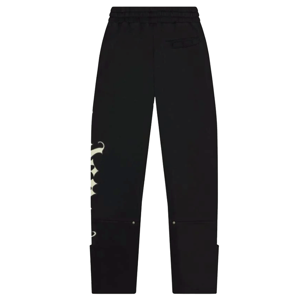 Back view of the Godspeed OG Logo V2 black sweatpants. The image highlights the clean fit, elastic waistband, a single back pocket on the right side, and the wrap-around edge of the Gothic logo on the left leg.