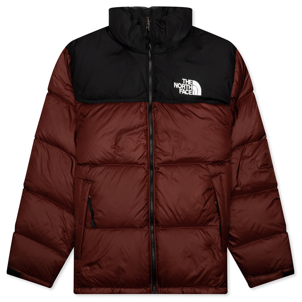 Brown puffer jacket with black hood and The North Face logo on a white background