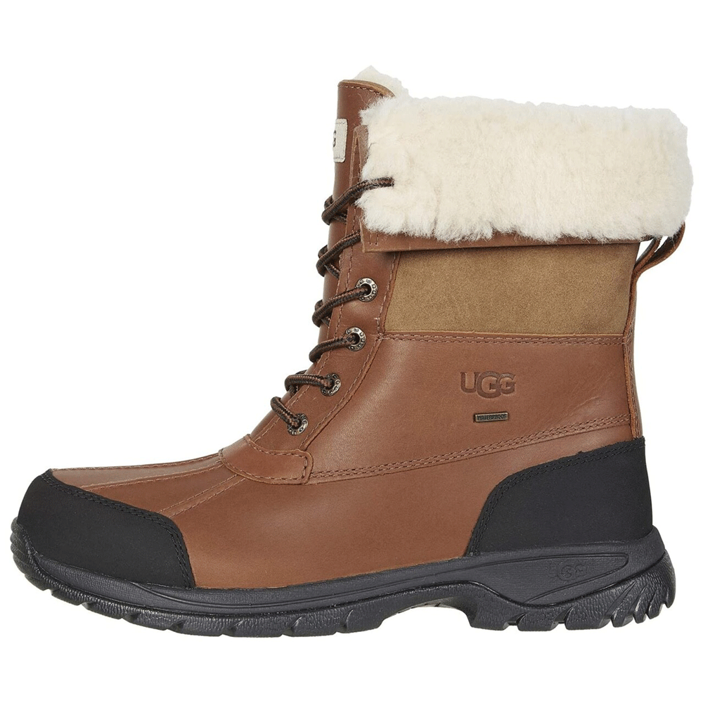 Side view of a single UGG® Men’s Butte Boot in Worchester brown leather. The high-shaft, waterproof winter boot features a rolled sheepskin cuff, durable black rubber heel and toe guards, and a visible 'Waterproof' tag near the UGG logo.
