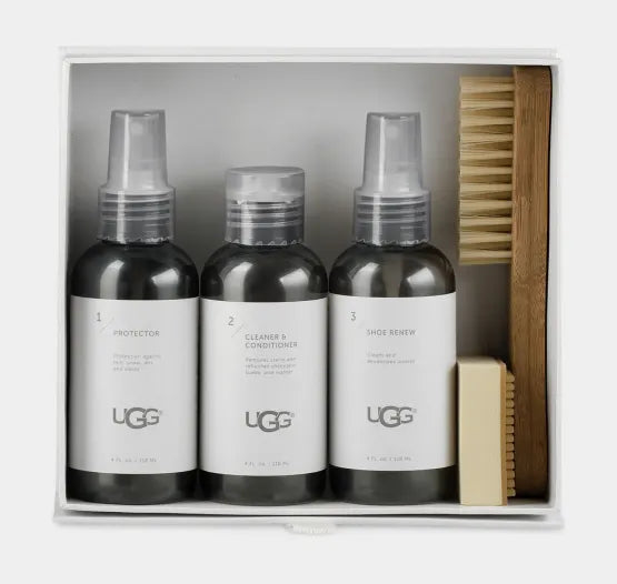UGG shoe care product set with three bottles and a brush in a box