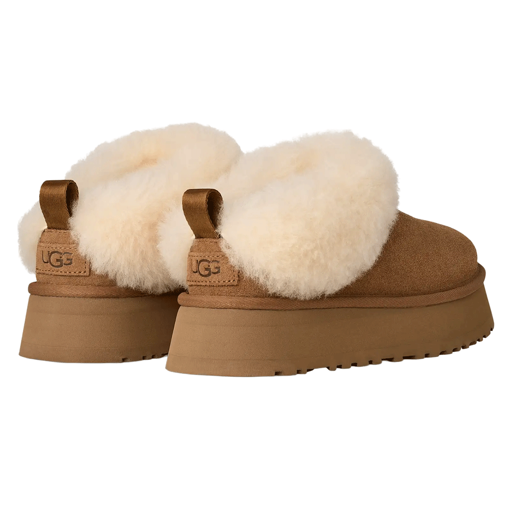 Rear-angle view of a pair of Chestnut UGG Tazzelle platform slippers. The image highlights the voluminous cream sheepskin collar, the UGG logo heel tab, and the thick, Sugarcane EVA platform sole.