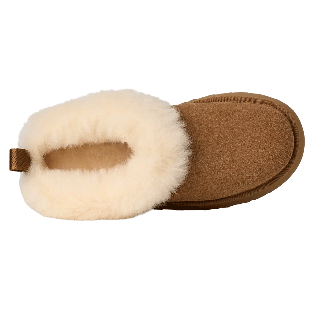 Top-down view of a single Chestnut UGG Tazzelle slipper, highlighting the open back and the ultra-plush, cream-colored sheepskin lining and collar that covers the instep.