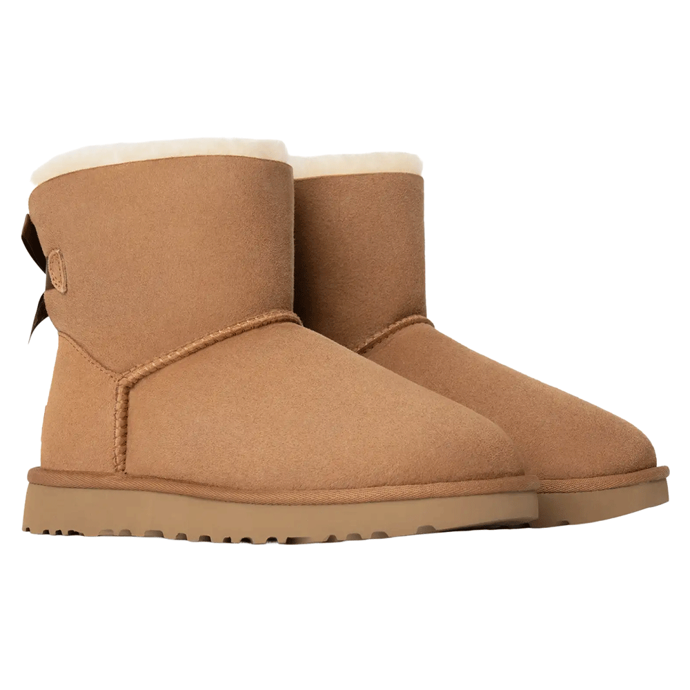 Pair of chestnut UGG Mini Bailey Bow II boots with visible shearling lining and a dark brown satin bow on the heel of the left boot.