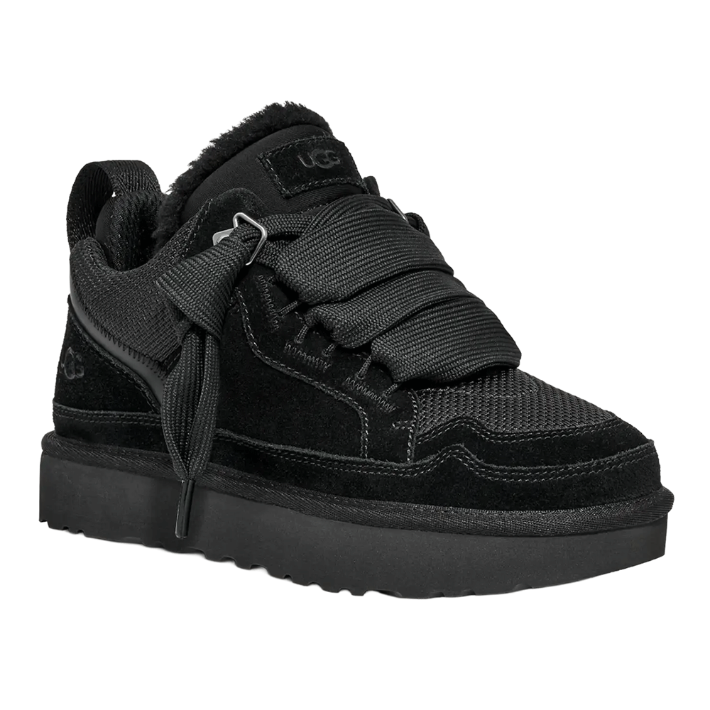 Angled view of the black UGG Lowmel sneaker with a suede and mesh upper, padded collar, and extra-wide black ribbon laces tied loosely.