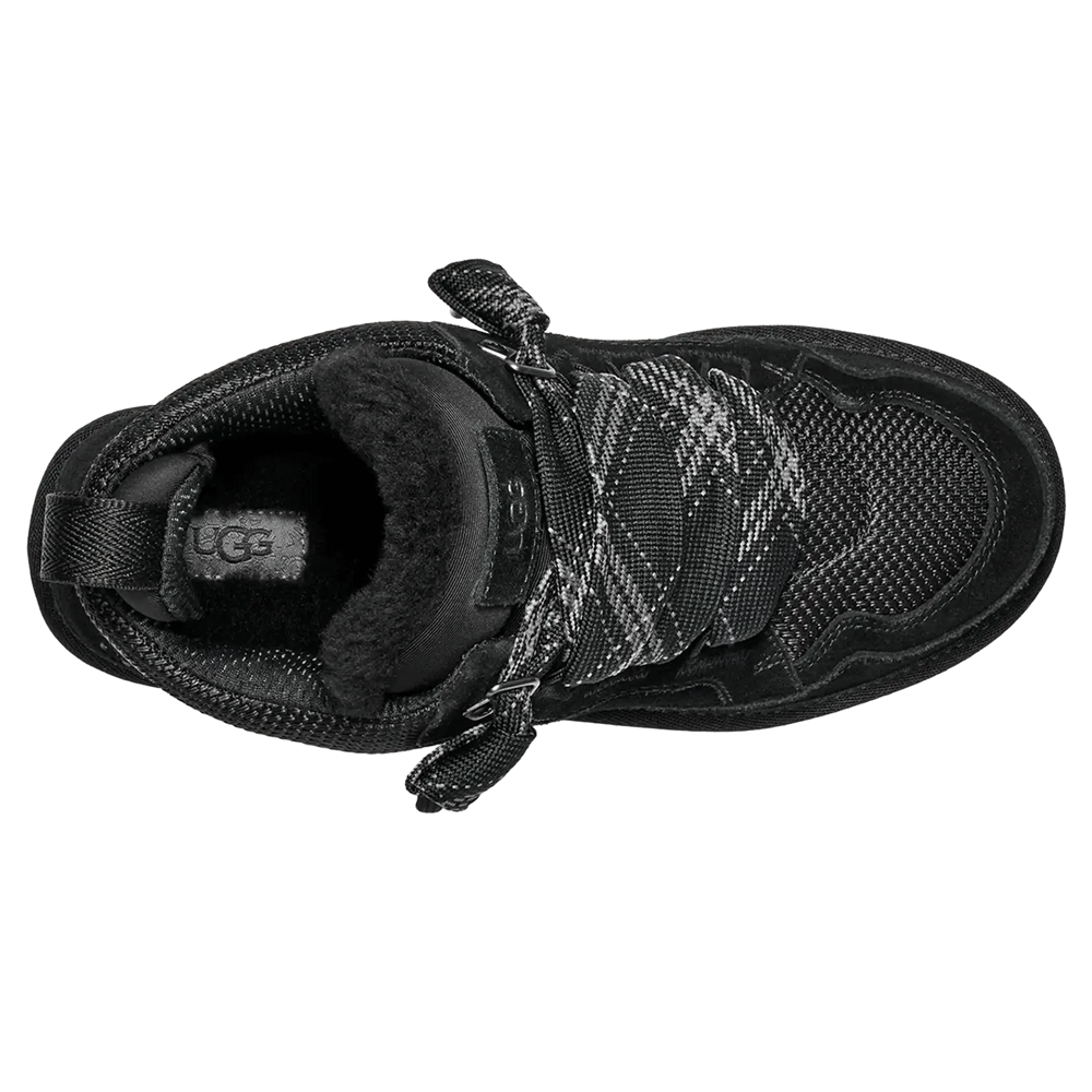Overhead view of the black UGG Lowmel sneaker showing the UGGplush lining, black mesh upper, and the wide two-tone patterned laces.