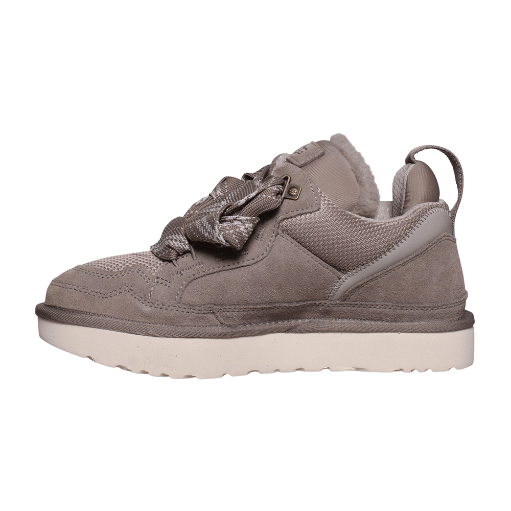 Side profile of the UGG Lowmel sneaker in Smoke Plume, showing the suede and mesh upper, wide loose laces, and thick off-white sole.