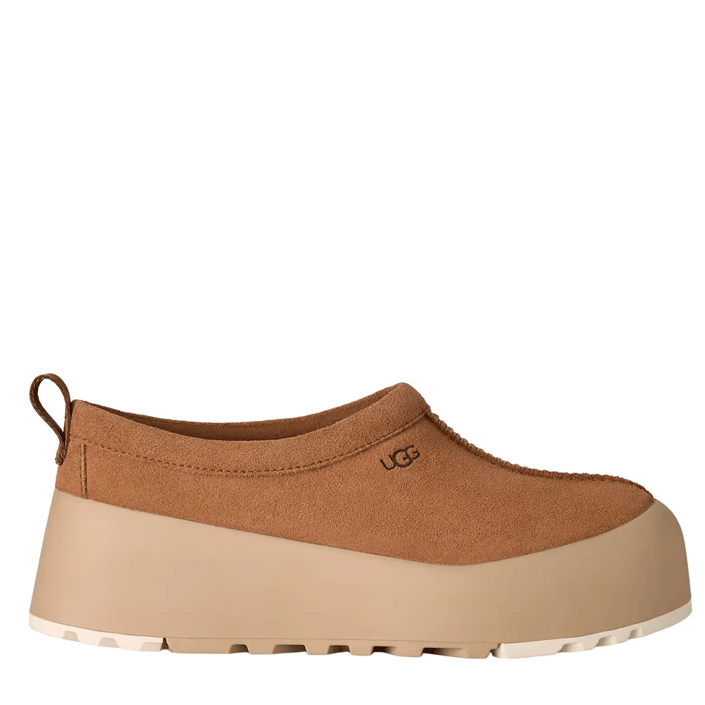Side view of the Chestnut Tasman StreetScape UGG mule, featuring a water-resistant suede upper, an oversized, contrasting Mustard Seed platform outsole with ridged treads, and a rear pull tab.