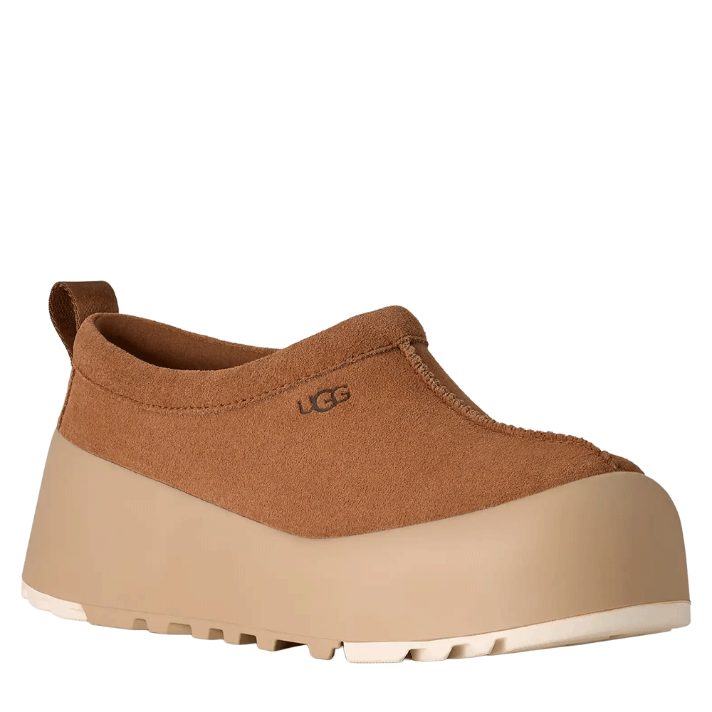 Side view of the Chestnut Tasman StreetScape UGG mule, featuring a water-resistant suede upper, a prominent rear pull tab, and a solid, contrasting light beige platform outsole with a rugged tread.