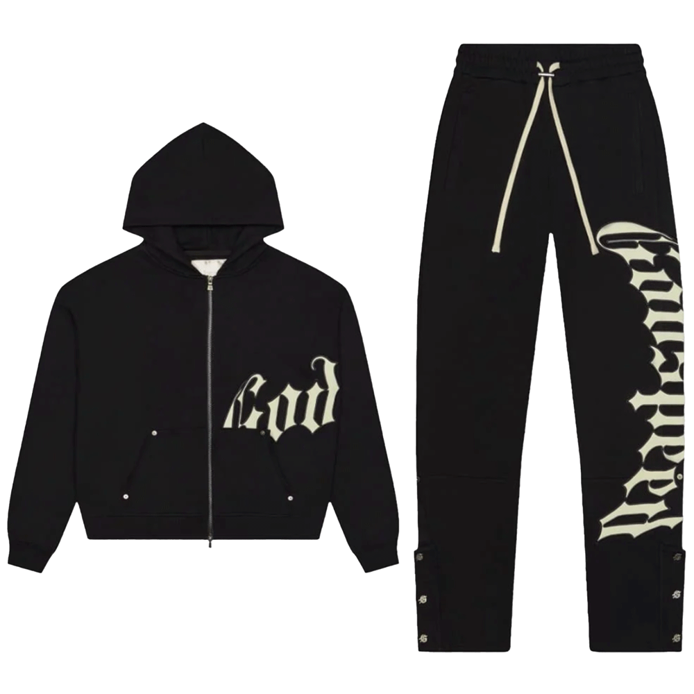 A black streetwear sweatsuit from Godspeed featuring a zip-up hoodie and matching sweatpants. The hoodie has "God" in large white Gothic-style font on the left side, and the pants feature "Godspeed" in a vertical white Gothic font down the left leg with extra-long cream drawstrings and button-snap cuffs.