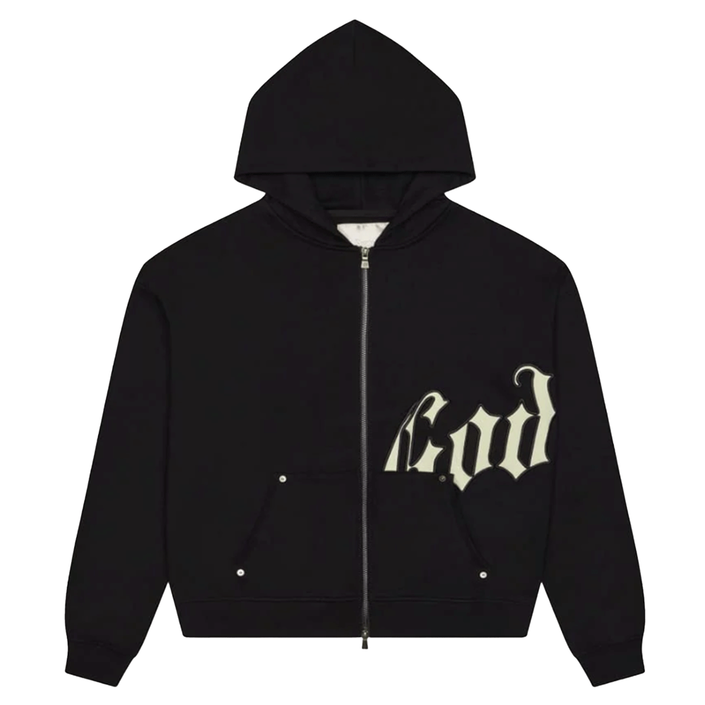 Front view of a Godspeed OG Logo V2 black zip-up hoodie. The hoodie features a heavyweight fit with a white Gothic "God" logo appliqué on the lower left side, silver hardware, and visible stitching details on the kangaroo pockets.