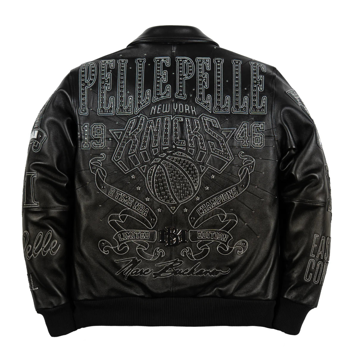Full back view of an all-black Pelle Pelle leather jacket from the "For The City" New York Knicks collection. The jacket features monochrome black embroidery with heavy silver-toned crystal/rhinestone studs outlining the "PELLE PELLE" arc, the "KNICKS" basketball logo, and the "1946" year. The design includes "2 Time NBA Champions" banners and a Marc Buchanan signature in silver-grey thread on a black leather base.