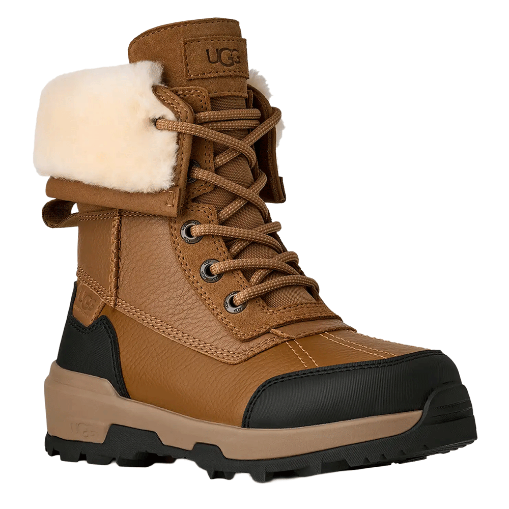 UGG Kid's waterproof chestnut brown leather winter boot with a lace-up front, cream shearling fold-over cuff, and rugged black and tan traction sole.
